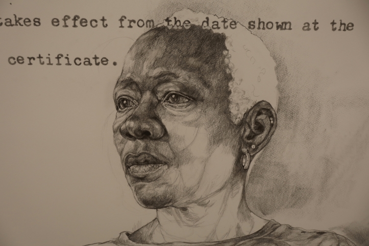 Black and white drawing of a woman superimposed on typed words - takes effect from the date shown at the certificate